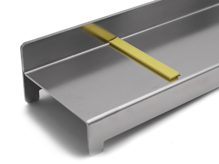 Heavy-duty bladeless stainless steel soap planer comes with a silicone strip for covering the sharp edge when it is not in use.